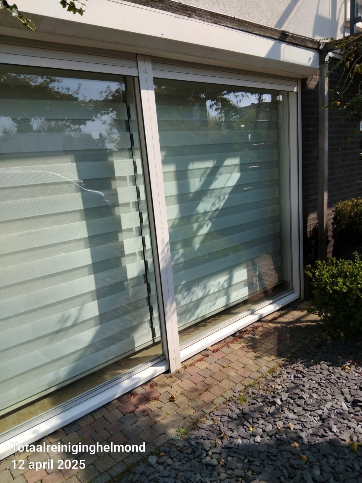 Glazenwasser / periodieke glasbewassing voorbeeldfoto